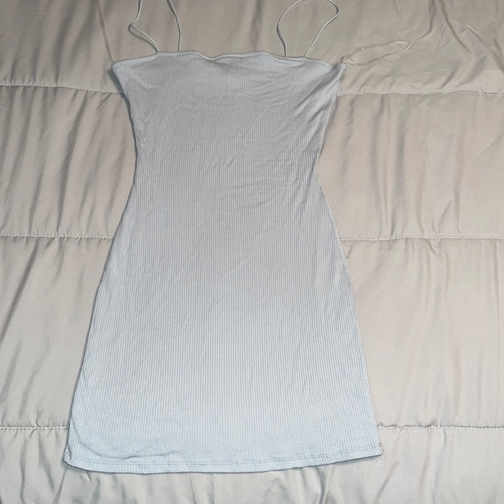 Light blue fitted dress.